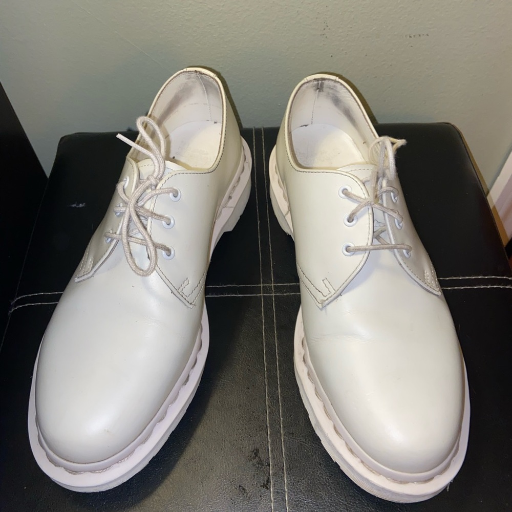 White Low top Dr. Martens.